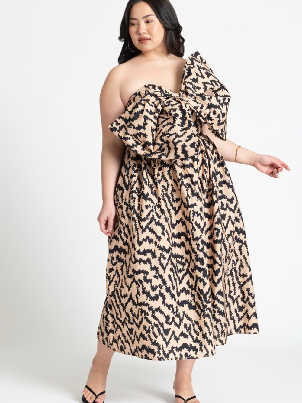 ELOQUII Strapless Bow Midi Dress in Beige and Black